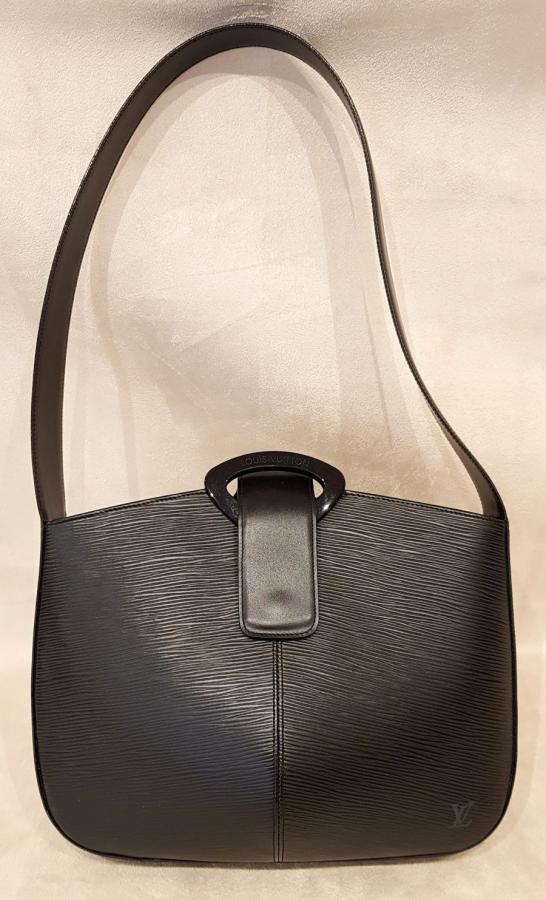 LOUIS VUITTON  Bag in black leather, More Informations...